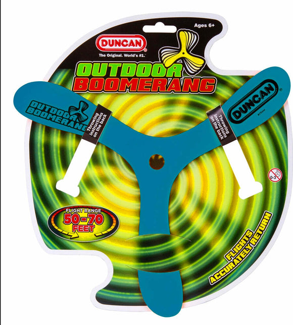 Duncan Outdoor Boomerang displayed on a vibrant packaging featuring swirling green and yellow graphics. The boomerang is in bright blue with white handles, marked with the brand name. Details include flight range specifications indicating it flies accurately within 50 to 70 feet and is suitable for ages 6 and up.