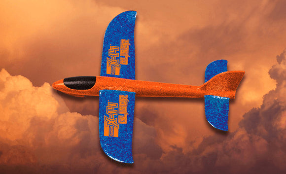 The X-14 Glider in vibrant orange and blue colors features aerodynamic wings and a sleek design, perfect for outdoor fun and flying adventures. Includes a hand launcher for easy launching.