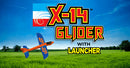 The X-14 Glider with Hand Launcher features a bright orange and blue design against a clear blue sky with green fields in the background. The image showcases the glider product logo, emphasizing fun and outdoor play.