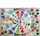 A colorful 100-piece jigsaw puzzle titled 'Love of Crystal & Gems' by Eeboo. Features various gems and crystals arranged in a vibrant, circular design, labeled with names like Citrine, Quartz, and Ruby.