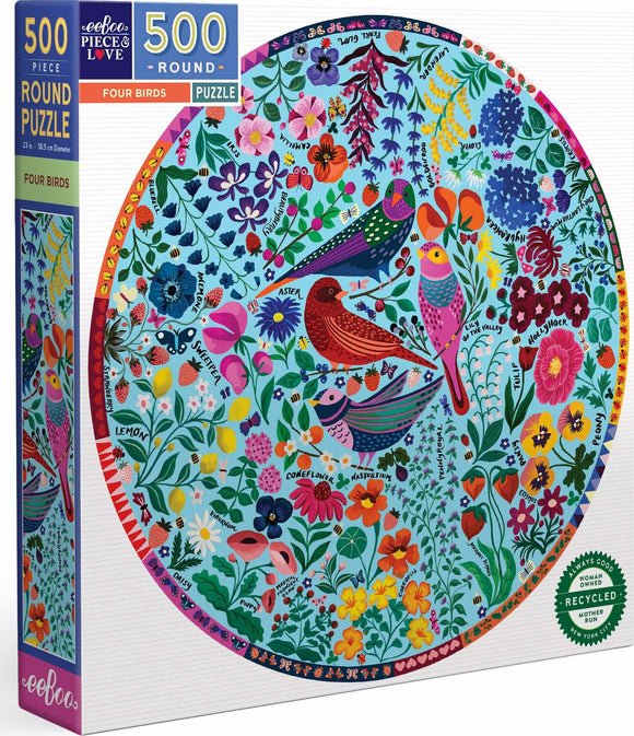 Eeboo's Four Birds round jigsaw puzzle featuring a vibrant and colorful illustration of various birds surrounded by a variety of flowers and plants. The puzzle contains 500 pieces and is designed for ages 3 and up. The box showcases the round puzzle image and includes labels indicating it is made from recycled materials and is woman-owned.
