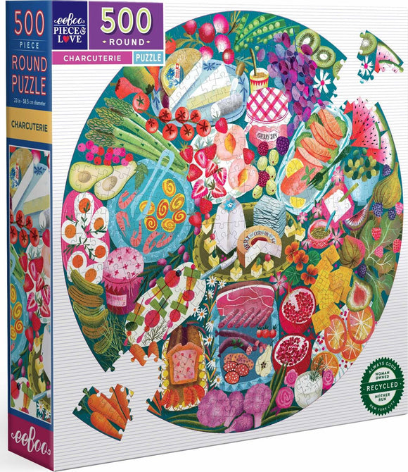 Eeboo Charcuterie 500-piece jigsaw puzzle featuring a vibrant and colorful illustration of a variety of food items including cheeses, fruits, and vegetables arranged in a circular pattern. The puzzle is packaged in a sturdy box with eco-friendly certification.