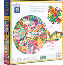 Eeboo Charcuterie 500-piece round jigsaw puzzle featuring an array of colorful foods, including fruits, vegetables, cheeses, and snacks, displayed on a vibrant platter. The puzzle has a diameter of 23 inches (58.5 cm) and includes a sample of the actual puzzle piece size on the side.