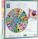 An enchanting 500-piece round jigsaw puzzle titled 'Dogs of the World' by Eeboo. The design features a colorful collage of dog breeds from around the globe, with a vibrant border and an image of a puzzle piece showing a Corgi. The box displays playful dog illustrations and the puzzle's dimensions, 23 inches in diameter.