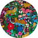A vibrant 500-piece jigsaw puzzle featuring a rich, colorful illustration of jaguars and butterflies amidst lush foliage and flowers. The circular design showcases intricate details with various shades of green, pink, red, and blue, enhancing the overall lively scene.