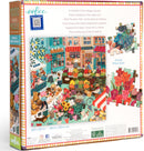 The English Green Market 1000-piece jigsaw puzzle by Eeboo features a colorful village square with vibrant stalls selling fresh produce, flowers, and baked goods. Illustrated by Victoria Ball, it invites users to explore the lively market scene filled with people chatting and shopping. The back of the box highlights the actual piece size.