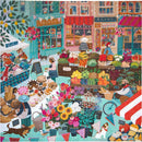 A colorful and detailed jigsaw puzzle featuring a bustling English market scene. The market showcases various stalls filled with fresh fruits, vegetables, baked goods, and flowers. People are seen shopping and interacting, including a person on a bicycle and a dog. The vibrant atmosphere captures the charm of a traditional market.