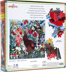 Eeboo's Poppy Bunny jigsaw puzzle box featuring a colorful illustration of a bunny surrounded by vibrant flowers, butterflies, and other wildlife. The box indicates it contains 1000 pieces and states the dimensions of 23 x 23 inches. A few puzzle pieces are displayed next to the box, showcasing their design and actual size.