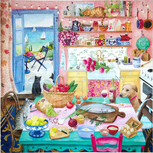 Colorful jigsaw puzzle featuring a pink kitchen scene with a variety of food items on a table. A dog and two cats observe the setting, with an inviting view of the sea and sailboats through an open door. The kitchen is vibrantly decorated, showcasing fruits, vegetables, and cooking tools, reflecting a cozy and lively atmosphere perfect for food lovers.