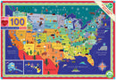 A colorful jigsaw puzzle titled 'This Land is Your Land' by Eeboo featuring a map of the United States and Canada. The puzzle showcases detailed illustrations of state symbols, landmarks, and wildlife within vibrant geographical boundaries. Ideal for ages 5 and up, this 100-piece puzzle highlights educational facts about each state and region, inviting families and children to explore and learn while piecing together the map.