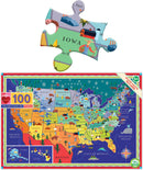 This Land is Your Land jigsaw puzzle by Eeboo features a colorful map of the United States with iconic landmarks and symbols representing each state. It includes a piece of the puzzle indicating Iowa and showcases various animals and scenes, making it educational and fun for kids and adults alike. Recommended for ages 5 and up, the puzzle consists of 100 pieces and includes state facts.