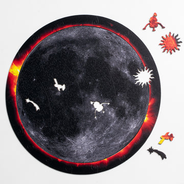 Moon with the sun's corona, showing several whimsy pieces