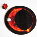 Jigsaws showing partial eclipse with sun-shaped whimsy piece