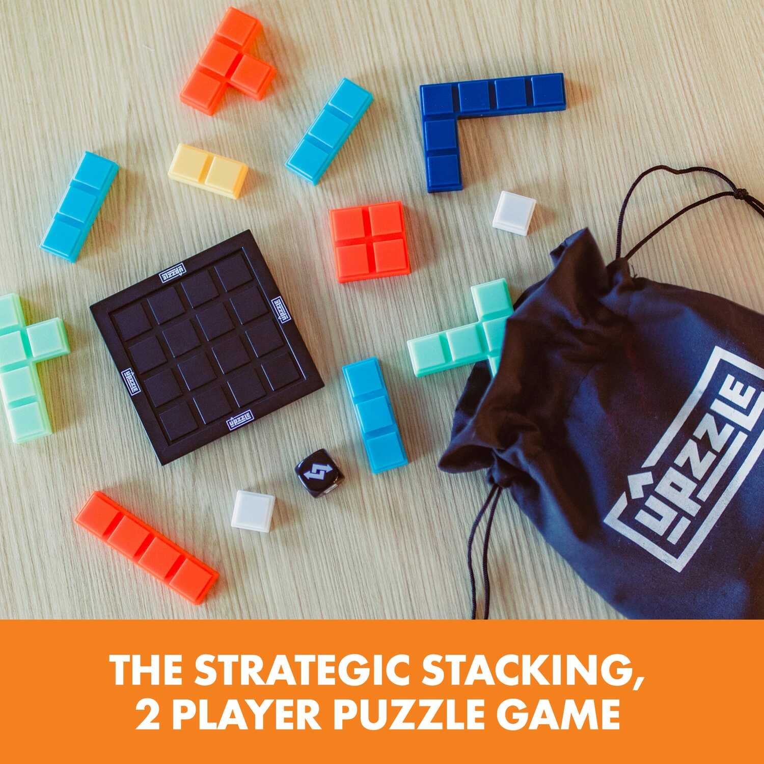 Upzzle by Educational Insights is a two-player strategic stacking game. The image features colorful plastic blocks in various shapes displayed around a square game board, along with a black drawstring bag and a dice. Perfect for enhancing critical thinking and problem-solving skills while having fun.