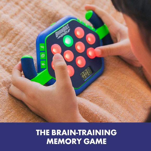 A child playing with the BrainBolt Boost memory game. The device features vibrant red and green buttons and a digital timer, designed to enhance memory skills. The user is pressing the colorful buttons while focused on the screen displaying a countdown.