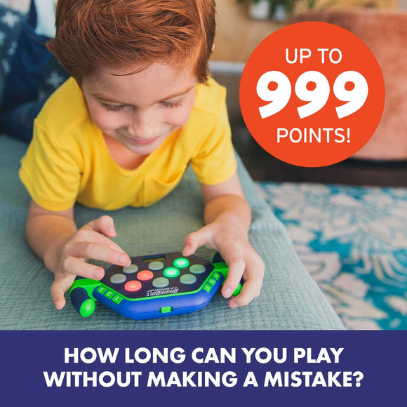 A child with short red hair playing with the BrainBolt Boost game, which features colorful buttons and a score indicator showing up to 999 points. The child is focused and smiles, showcasing the interactive and fun nature of the game.