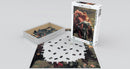 La Belle Dame sans Merci jigsaw puzzle by Eurographics, featuring a 1000-piece illustration of an art piece by Sir Frank Bernard Dicksee. The box is partially open, showing some pieces scattered on a smooth surface, with a few already placed.