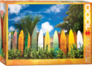 Surfer's Paradise Hawaii jigsaw puzzle by Eurographics featuring a beautiful scene of colorful surfboards lined against a vibrant landscape of palm trees and blue skies. Perfect for puzzle lovers who enjoy beach and surf themes, this 1000-piece puzzle captures the essence of Hawaii.
