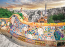 A vibrant jigsaw puzzle depicting the colorful architecture of Park Güell in Barcelona. The image features the iconic mosaic-covered bench, with patterns of various colors, surrounded by beautiful greenery and a distant city skyline. The puzzle showcases the artistic style of Gaudí, making it a delightful challenge for puzzle enthusiasts.