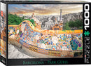 A beautifully designed jigsaw puzzle featuring the vibrant mosaics and architectural wonders of Park Güell in Barcelona, created by Eurographics. The image showcases a colorful tiled wall with intricate designs against a backdrop of the city skyline, encapsulating the essence of this iconic landmark. This 1000-piece puzzle promises hours of engaging fun and creativity for puzzle enthusiasts.