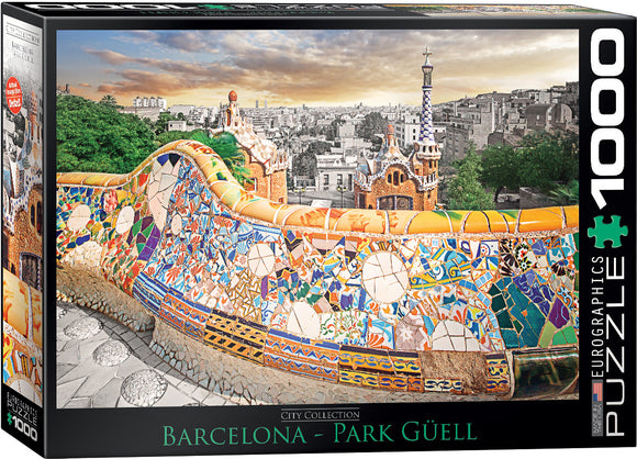A beautifully designed jigsaw puzzle featuring the vibrant mosaics and architectural wonders of Park Güell in Barcelona, created by Eurographics. The image showcases a colorful tiled wall with intricate designs against a backdrop of the city skyline, encapsulating the essence of this iconic landmark. This 1000-piece puzzle promises hours of engaging fun and creativity for puzzle enthusiasts.