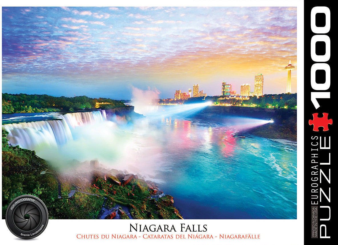 Eurographics 1000-piece jigsaw puzzle featuring a breathtaking view of Niagara Falls, capturing the vibrant colors of the waterfall and surrounding city skyline at dusk. Ideal for puzzle enthusiasts and nature lovers alike.