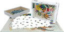 The Dominant Curve jigsaw puzzle by Eurographics features a vibrant and colorful abstract artwork by Wassily Kandinsky. The box displays the completed design while puzzle pieces are scattered on a flat surface, with some pieces fitting into the partially completed puzzle.