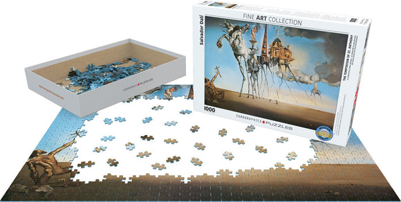The Temptation of St. Anthony jigsaw puzzle by Eurographics, featuring a 1000-piece design. The box is shown with partially completed puzzle pieces arranged on a flat surface. The artwork depicts surreal imagery associated with Salvador Dali, showcasing vibrant blues and earth tones.