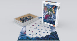 The Blue Violinist puzzle by Marc Chagall, created by Eurographics, featuring a vibrant jigsaw design with a finely detailed portrayal of a violinist. The image shows the puzzle pieces scattered on a flat surface beside the box, emphasizing the colorful artistry and creative challenge involved in assembling this 1000-piece jigsaw puzzle, part of the Fine Art Collection.