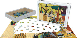 A jigsaw puzzle featuring 'The Tilled Field' by Joan Miró. The partially completed puzzle lies on a table, showing vibrant colors and abstract designs. The box of the puzzle is displayed beside it, labeled with the title and artist's name. Puzzle pieces are scattered around, some resembling elements from the painting, including animals, plants, and geometric shapes.