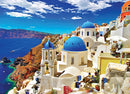 A vibrant Jigsaw puzzle featuring the stunning view of Oia, Santorini, Greece. The image showcases traditional white buildings with blue domes, the deep blue Aegean Sea, and dramatic cliffs under a bright blue sky with fluffy clouds. This captivating scene invites puzzle lovers to recreate the beauty of this iconic destination.