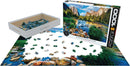 Yosemite National Park jigsaw puzzle by Eurographics featuring a 1000-piece scenic image of Yosemite's landscapes, with puzzle pieces scattered around the box and partially completed layout.