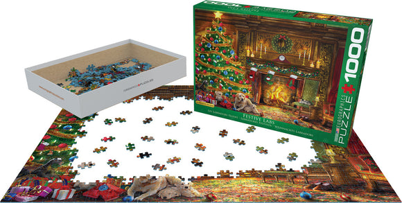 Eurographics Festive Labs jigsaw puzzle featuring a cozy holiday scene with a decorated Christmas tree, a fireplace, and playful Labrador puppies. The puzzle box displays vibrant colors and images, with pieces scattered around and one container showing the puzzle pieces inside.