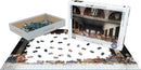A 1000-piece jigsaw puzzle featuring Leonardo da Vinci's iconic artwork, The Last Supper. The image includes a partially completed puzzle on a white surface, with pieces scattered around. The puzzle box is shown with the artwork's image on the front and a tray with loose puzzle pieces nearby, emphasizing the intricate design and colors of this fine art collection.