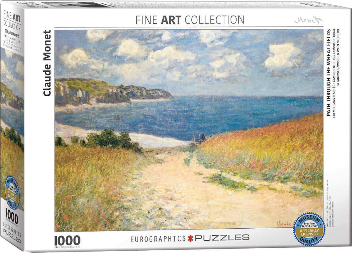 A jigsaw puzzle of Claude Monet's 'Path through the Wheat Fields' depicting a scenic pathway leading through vibrant golden fields toward a tranquil blue sea under a cloudy sky. The puzzle features 1000 pieces and is part of Eurographics' Fine Art Collection, showcasing museum-quality artwork.