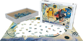 A jigsaw puzzle titled 'Yellow; Red; Blue' by Wassily Kandinsky, produced by Eurographics. The image shows the puzzle box and scattered pieces with a partially completed puzzle featuring abstract art colors and shapes. The box indicates it contains 1000 pieces and is part of the Fine Art Collection.
