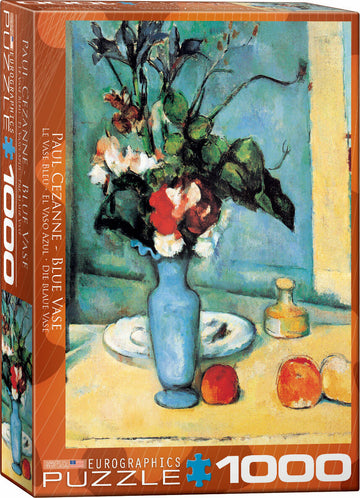 Jigsaw puzzle featuring Paul Cezanne's 'Blue Vase', depicting a blue vase with flowers on a table alongside fruits. The packaging shows vibrant colors and includes the title in multiple languages.