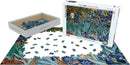 Irises by Vincent van Gogh jigsaw puzzle made by Eurographics. The image shows a colorful, intricate design of irises with vibrant blue and green hues, scattered puzzle pieces, and the puzzle box with the artwork displayed on its front. This 1000-piece puzzle is part of the Fine Art Collection.