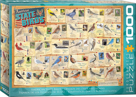 A colorful jigsaw puzzle featuring the American State Birds, designed by Eurographics. The puzzle showcases various state birds with illustrations and facts about each bird, laid out in a grid format. It includes detailed images of birds such as the Northern Cardinal and American Goldfinch, alongside their respective states. The vibrant packaging emphasizes the national theme, combining art and education for all ages.