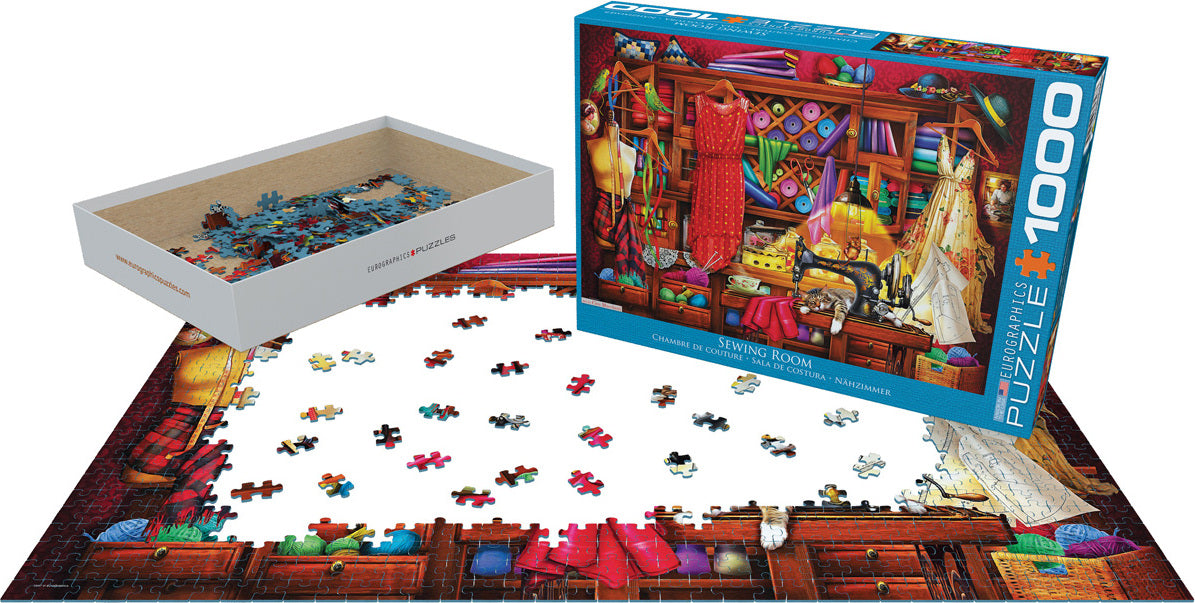 Eurographics Sewing Room jigsaw puzzle featuring a vibrant and detailed sewing workspace filled with colorful fabrics, dresses, and a sewing machine. The puzzle has 1000 pieces and is partially assembled with colorful pieces scattered around. The box shows the completed image of a well-organized sewing room, showcasing the intricate design and inviting atmosphere of creative sewing.