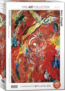 A jigsaw puzzle box featuring 'The Triumph of Music' artwork by Marc Chagall. The vibrant box art displays a colorful scene filled with musical themes, figures, and scenes depicting joy and creativity, with intricate details and bright colors that capture Chagall's distinctive style. The box is labeled Eurographics and indicates that it contains 1000 pieces, part of a fine art collection.