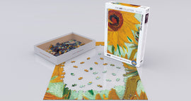 A jigsaw puzzle featuring a detailed reproduction of Vincent van Gogh's 'Twelve Sunflowers'. The image displays partially completed puzzle pieces on a table, alongside the box which contains 1000 pieces. The vibrant yellow sunflowers are highlighted against a textured background, showcasing Van Gogh's signature brush strokes.