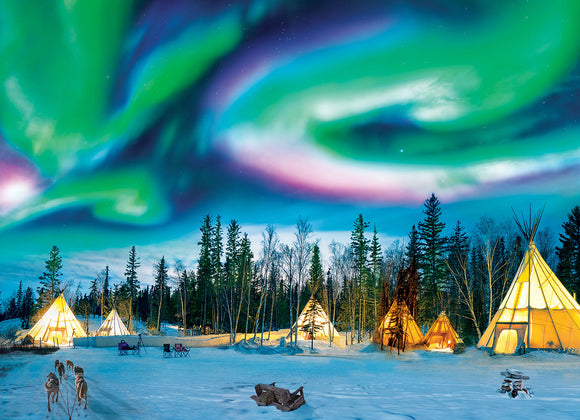 A vibrant jigsaw puzzle depicting the Northern Lights over Yellowknife. The scene features glowing teepees surrounded by snow, with a colorful aurora borealis illuminating the night sky filled with stars. Dog sleds are seen in the foreground, enhancing the enchanting wilderness atmosphere.