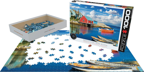 A 1000-piece jigsaw puzzle featuring a colorful scene of Peggy's Cove, Nova Scotia, including vibrant buildings, boats, and a clear sky. The puzzle pieces are spread out on a flat surface, with the box displayed next to them, showcasing the picturesque artwork on its front.