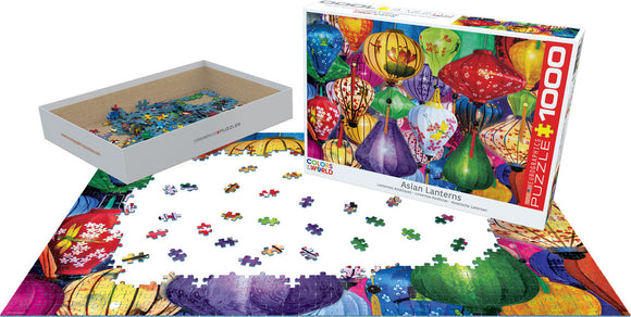Eurographics Asian Lanterns jigsaw puzzle featuring a vibrant and colorful design with various Asian lanterns. The puzzle is shown partially assembled, with scattered pieces in a box beside it. The box displays the cover artwork and puzzle piece count (1000 pieces).