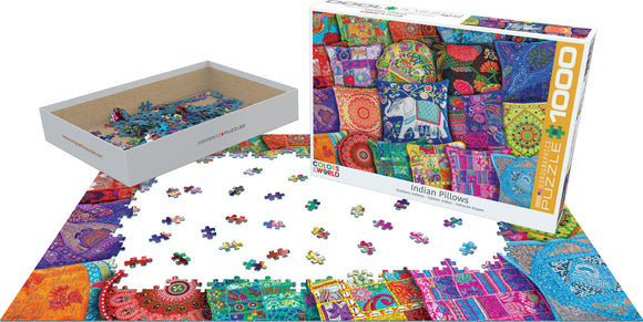 A vibrant 1000-piece jigsaw puzzle titled 'Indian Pillows' by Eurographics. The box features colorful designs of intricate Indian pillow covers, with scattered puzzle pieces displayed around the partially completed puzzle. The puzzle showcases a rich array of colors and patterns, reflecting traditional Indian textile artistry.