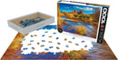 Eurographics 1000-piece jigsaw puzzle featuring Red Rock Crossing in Arizona. The image showcases a scenic view with a river surrounded by vibrant foliage. The puzzle pieces are scattered on a white surface next to the box, which displays the completed artwork. The box is open, revealing the remaining pieces inside, perfect for puzzle enthusiasts.