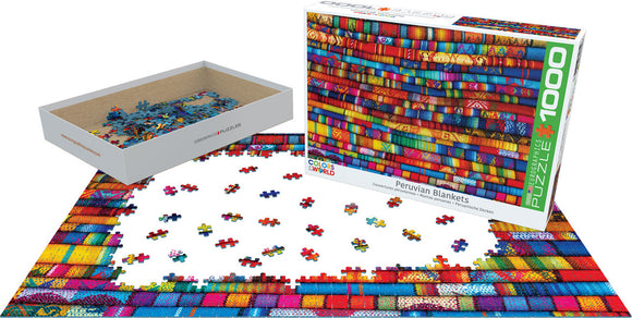 Eurographics Peruvian Blankets jigsaw puzzle featuring vibrant, colorful patterns inspired by traditional Peruvian textiles. The box shows the completed image with pieces scattered around, showcasing a 1000-piece challenge for puzzle enthusiasts.