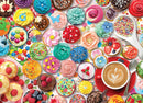 A vibrant assortment of colorful cupcakes and desserts, featuring various icing styles, sprinkles, and decorations. The background includes a cup of coffee on a red saucer, surrounded by a mix of cupcakes with flowers, fruits, and playful designs, creating a festive cupcake-themed atmosphere perfect for puzzle enthusiasts.