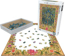 Tree of Life Tapestry jigsaw puzzle from Eurographics. The image shows the puzzle box, an array of colorful puzzle pieces in a tray, and some pieces laid out on a flat surface, showcasing the intricate floral design inspired by William Morris.